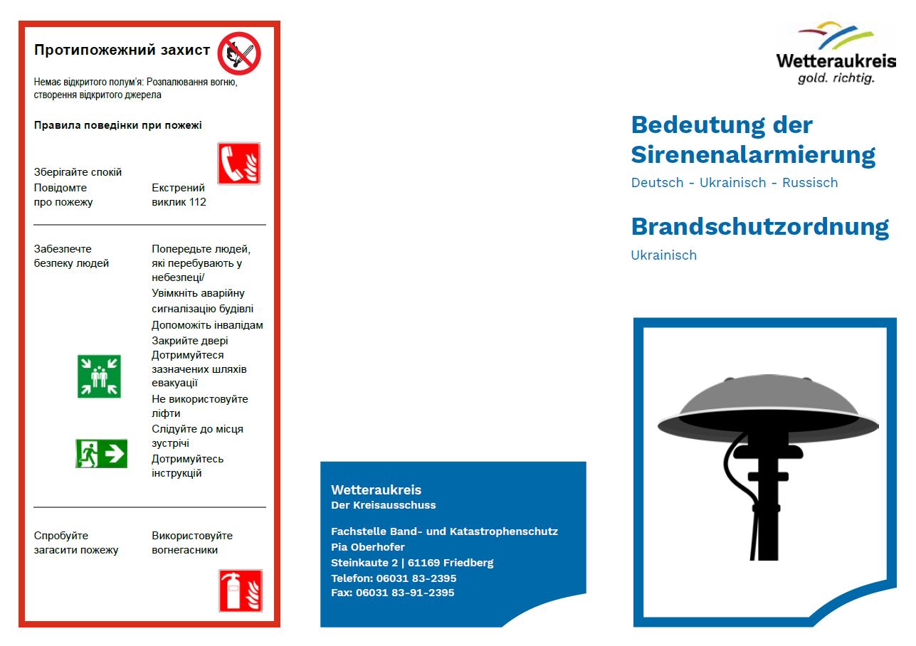 Flyer über Alarmierungshinweise auf Ukrainisch und Russisch